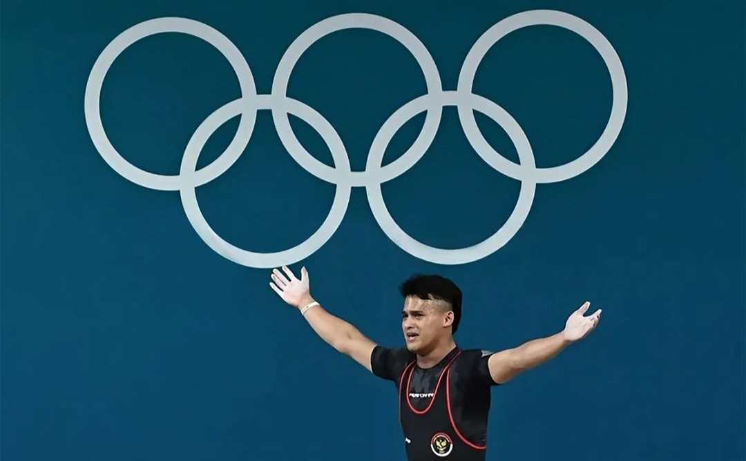 Yes! Atlet Angkat Besi Rizki Juniansyah Raih Emas di Olimpiade 2024