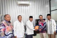 Sesi foto bersama saat kunjungan Badan Kesatuan Bangsa dan Politik (Kesbangpol) Provinsi Kalimantan Timur di ruang Walisongo Mediation Center (WMC) Lt. 1 Gedung Walisongo Center Kampus 3 UIN Walisongo Semarang, Senin (23/12/2024)
