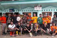 Satkorcab Banser Kendal usai pembersihan lumpur di fasilitas umum yang terdampak banjir bandang di Patebon Kendal. Kamis, 23/1/2025.