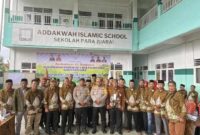 Foto bersama saat Musyawarah Daerah (Musda) Ke-V Dewan Pimpinan Daerah (DPD) Pujakesuma Kabupaten Karo dan Musyawarah Cabang (Muscab) Ke-V Dewan Pimpinan Cabang (DPC) Pujakesuma Kecamatan Kabanjahe, 
di Aula Madrasah Aliyah Negeri Kabanjahe, Jalan Samura Gg. Madrasah, pada Minggu (9/02/2025).
