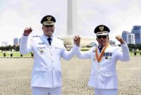 Bupati Toba, Effendi S. P. Napitupulu, dan Wakil Bupati Toba, Audi Murphy Sitorus, usai pelantikan di Istana Kepresidenan, Jakarta Pusat, Kamis (20/2/2025).