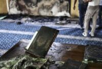 Aksi pembakaran Al Quran. (Sumber gambar: CNN Indonesia) 

